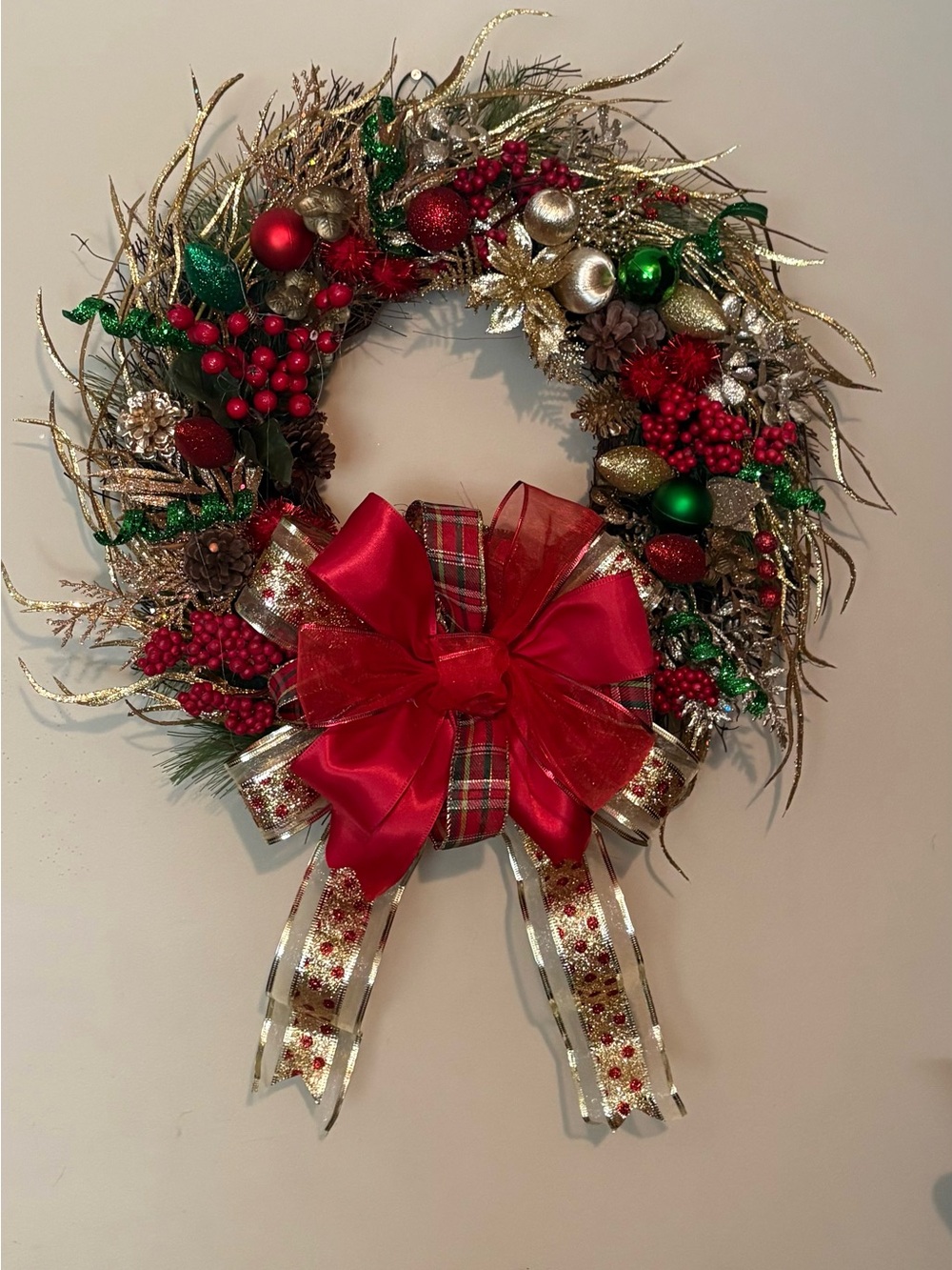 Festive Red & Green Holiday Wreath with Decorative Bow